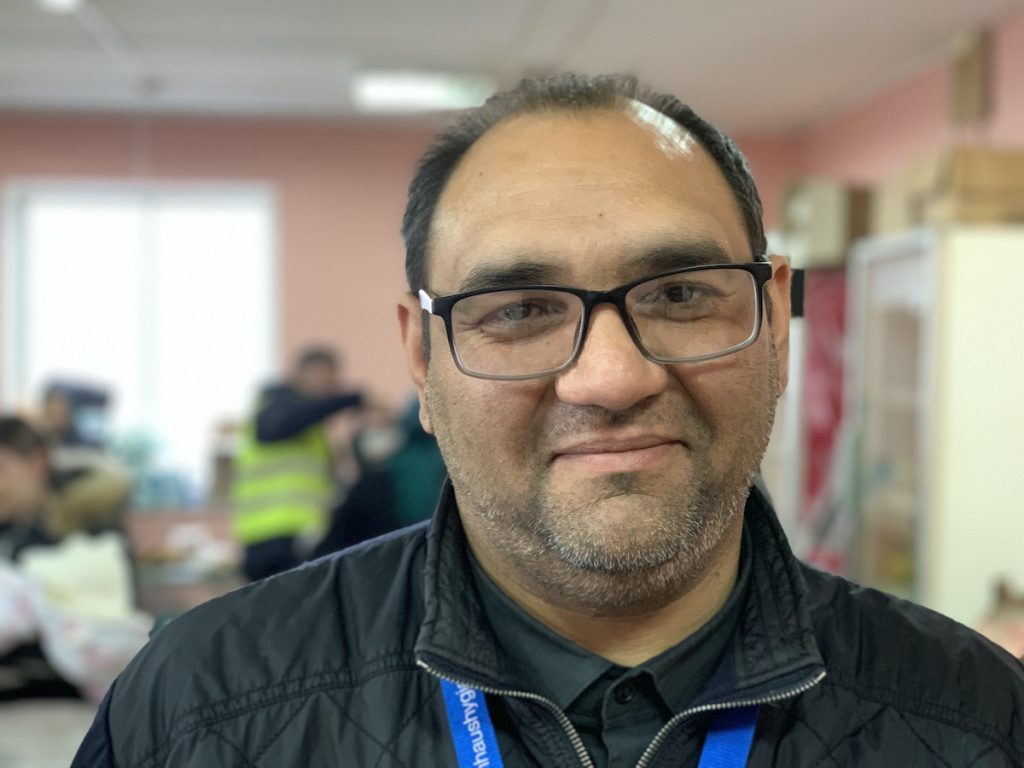 Maxim, who coordinates the help to refugees in the small building